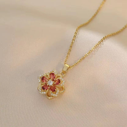 Rosavina goldfarbene Halskette mit Blumenanhänger aus Zirkonia und roten Steinen, Schmuck für Damen